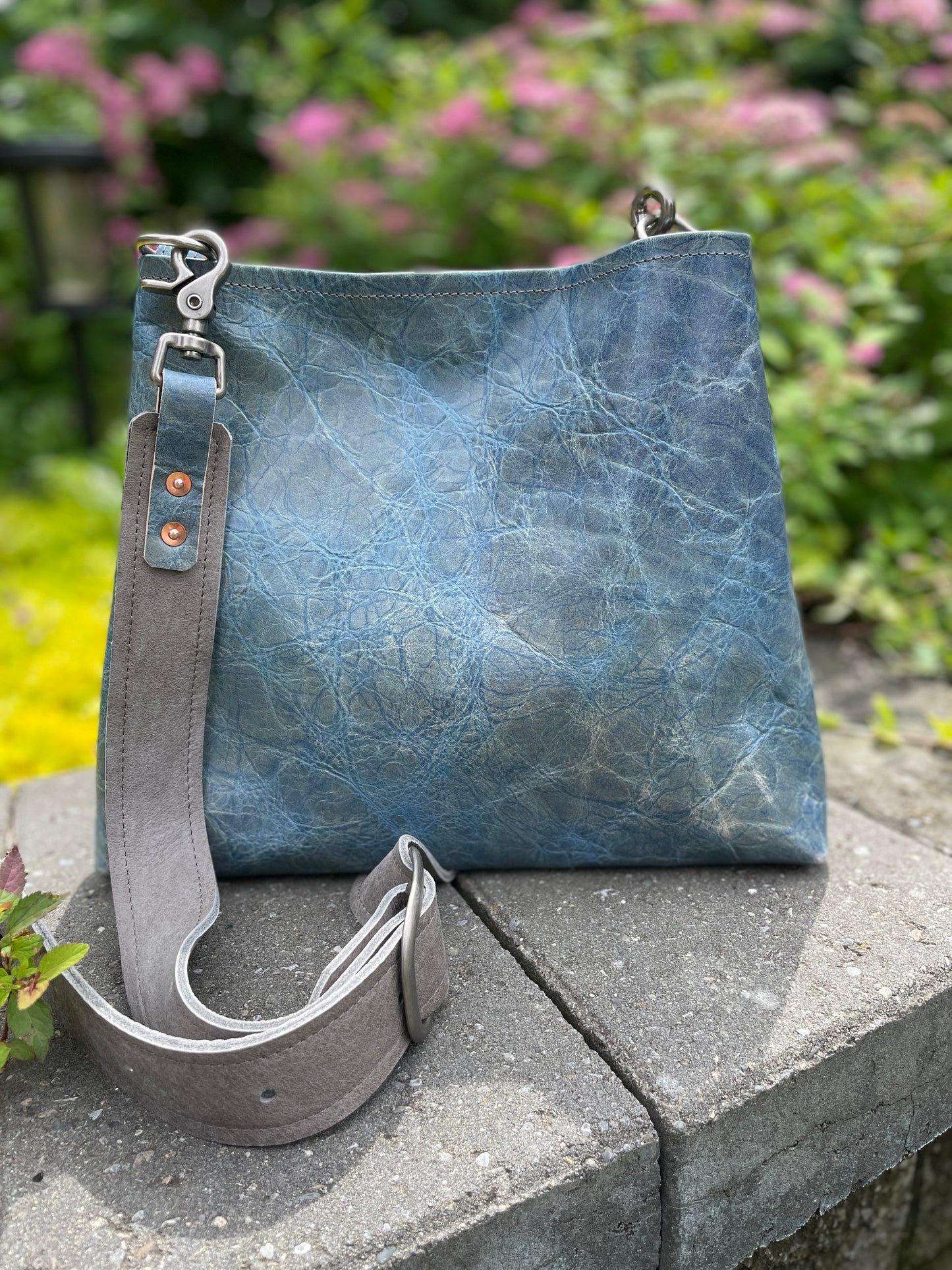 Sierra Blue leather crossbody or shoulder bag with soft grey adjustable leather strap.