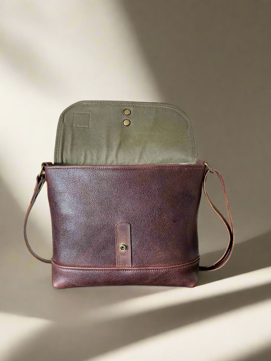 Handmade Lined leather messenger bag, unisex, in olive green lining and dark brown leather. 