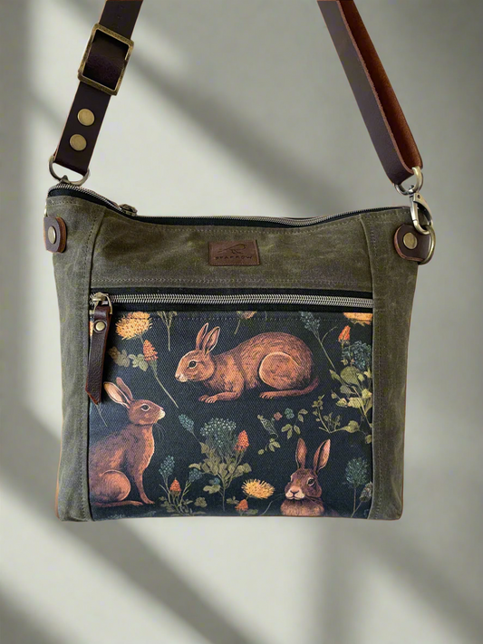 Cambridge crossbody bag in olive waxed canvas and medieval rabbit print