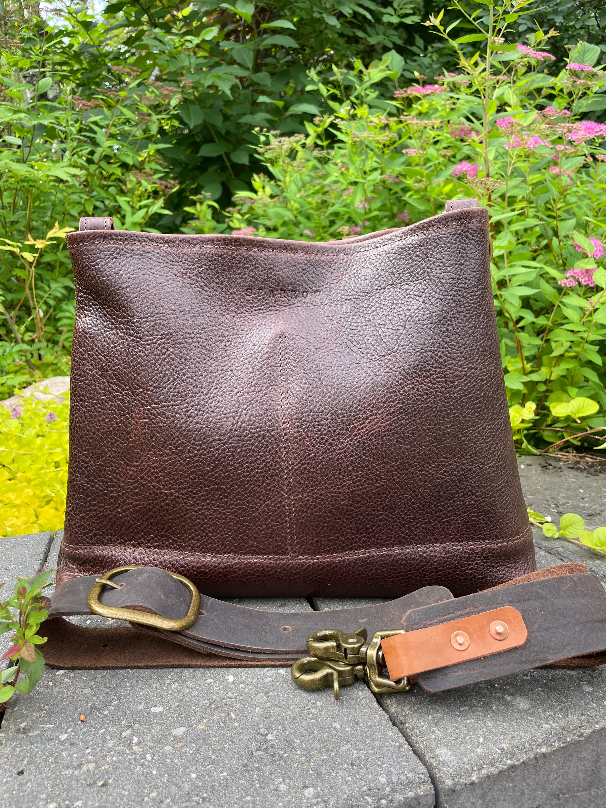 Sierra full grain leather bag in cold brew, a pebbly leather with a smooth finish. 