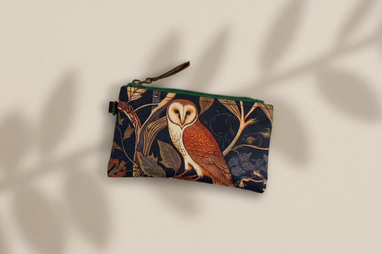 Waxed canvas zippered pouch with medieval owl design on front. Made by Sparrow Handmade in Calgary Canada. 