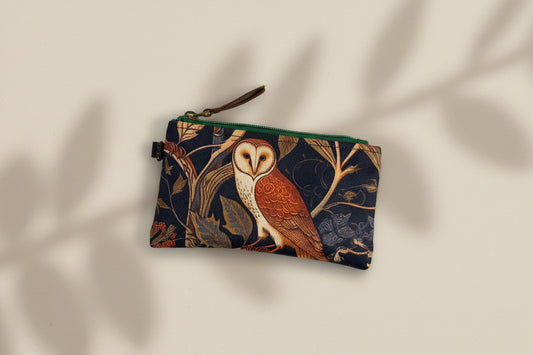 Waxed canvas zippered pouch with medieval owl design on front. Made by Sparrow Handmade in Calgary Canada. 