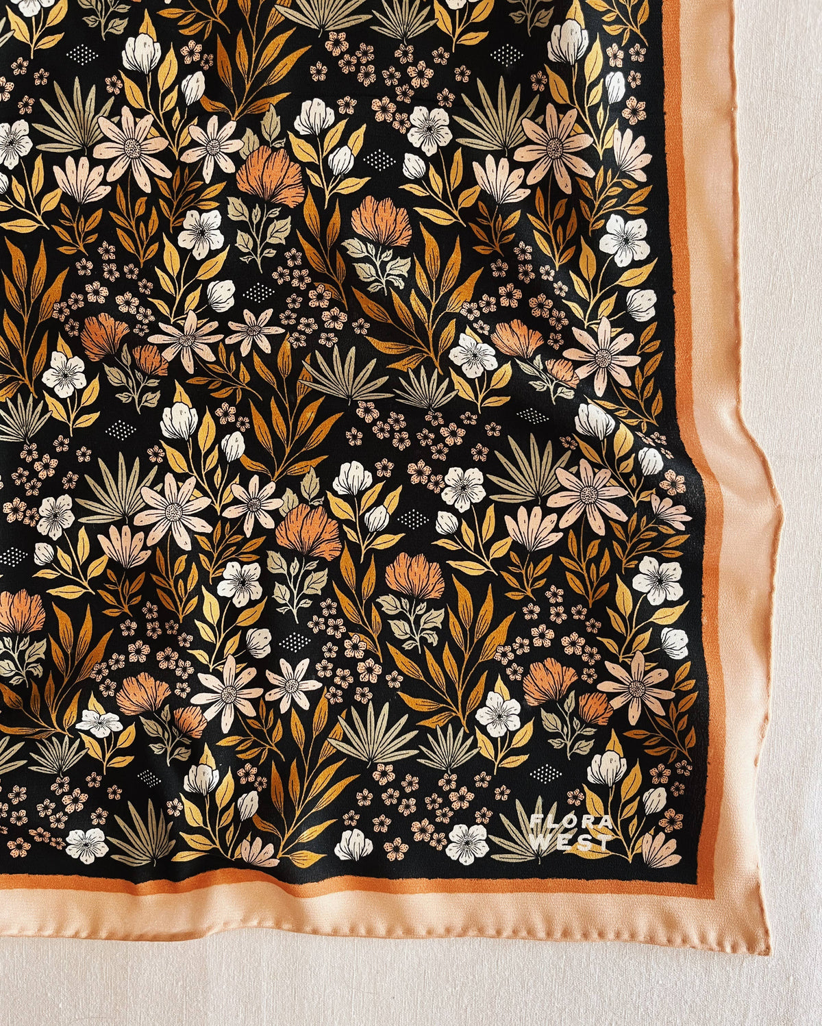 Silk scarf with brown and black tone floral pattern