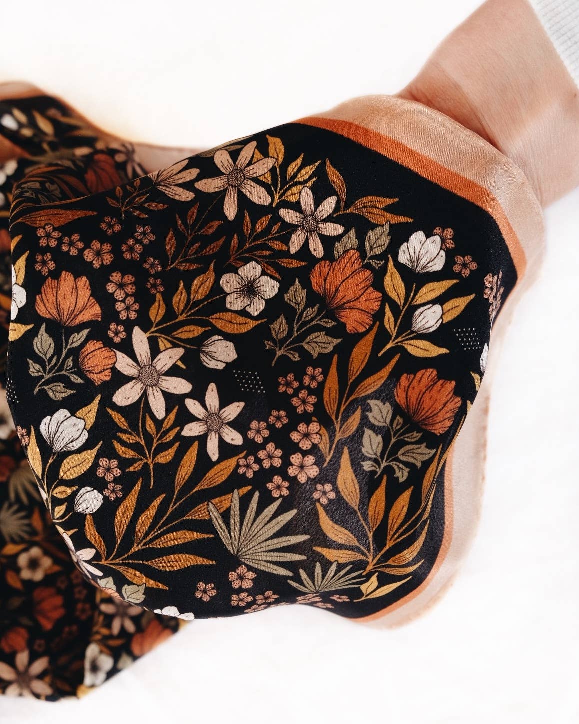 Silk scarf with brown and black tone floral pattern