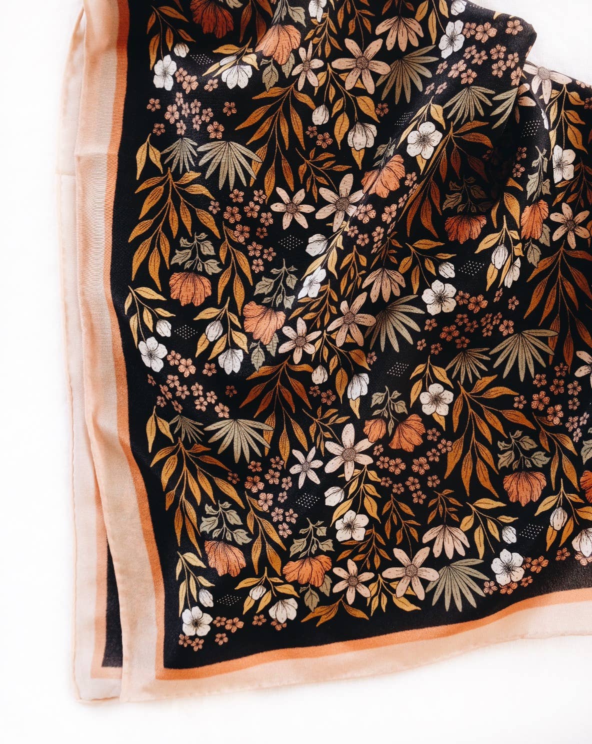 Silk scarf with brown and black tone floral pattern