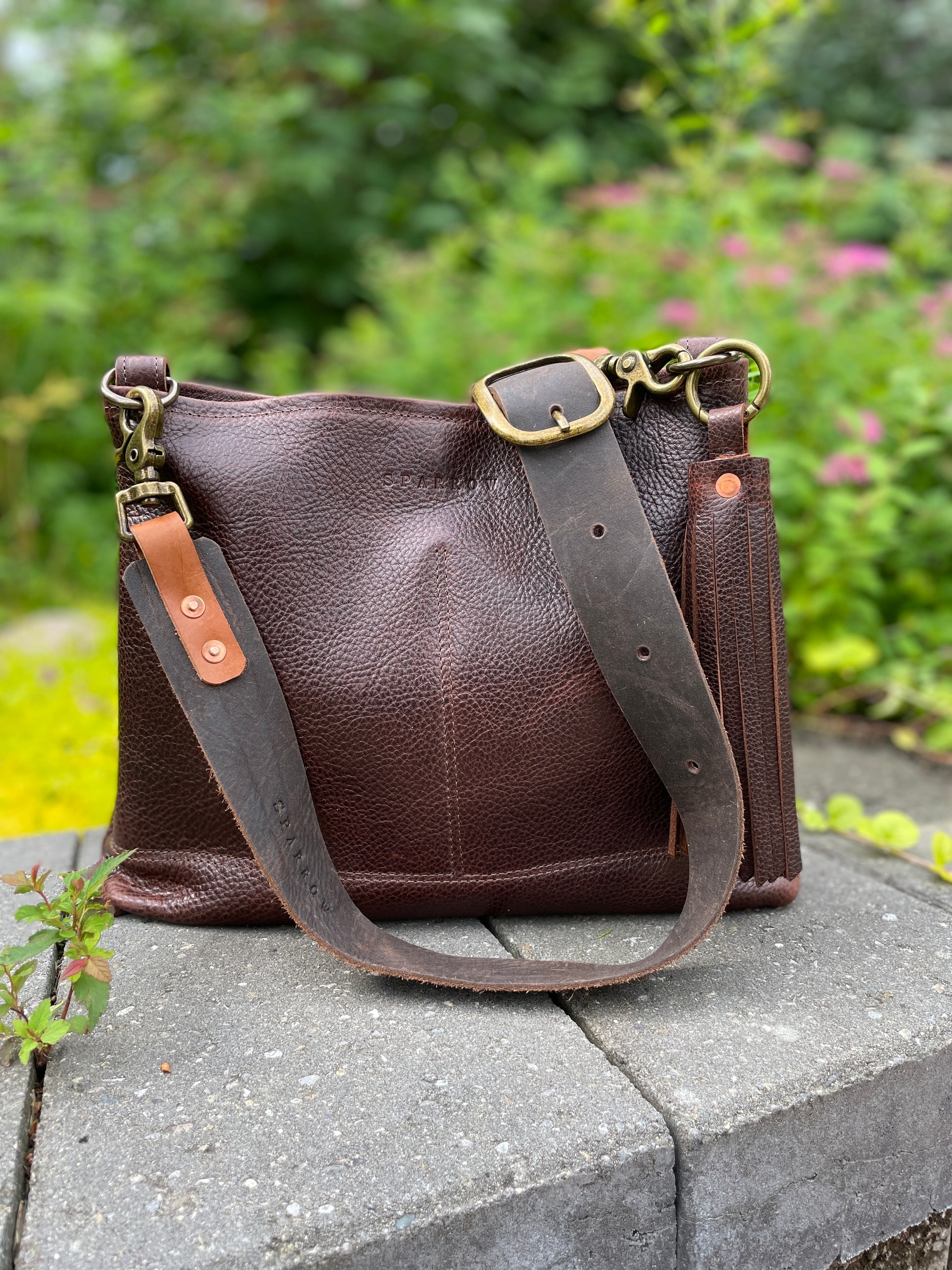 Sierra full grain leather bag in Cold Brew color, a pebbly slightly shiny leather. 